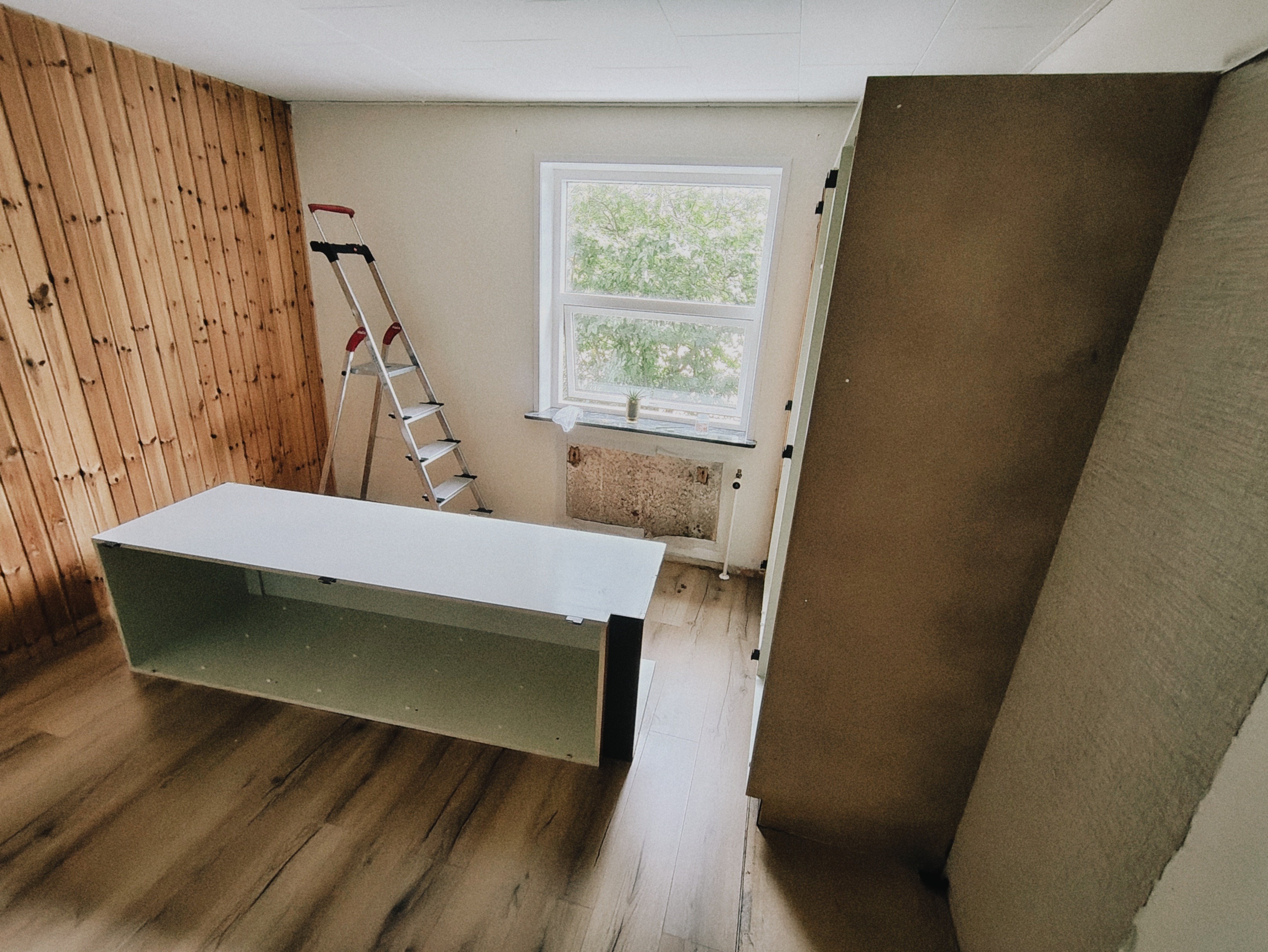 And so it begins. Finally, after weeks (if not months) of researching, planning, and procrastinating, we've started working on our first room in the house. (The snapshot is terrible, I know).
