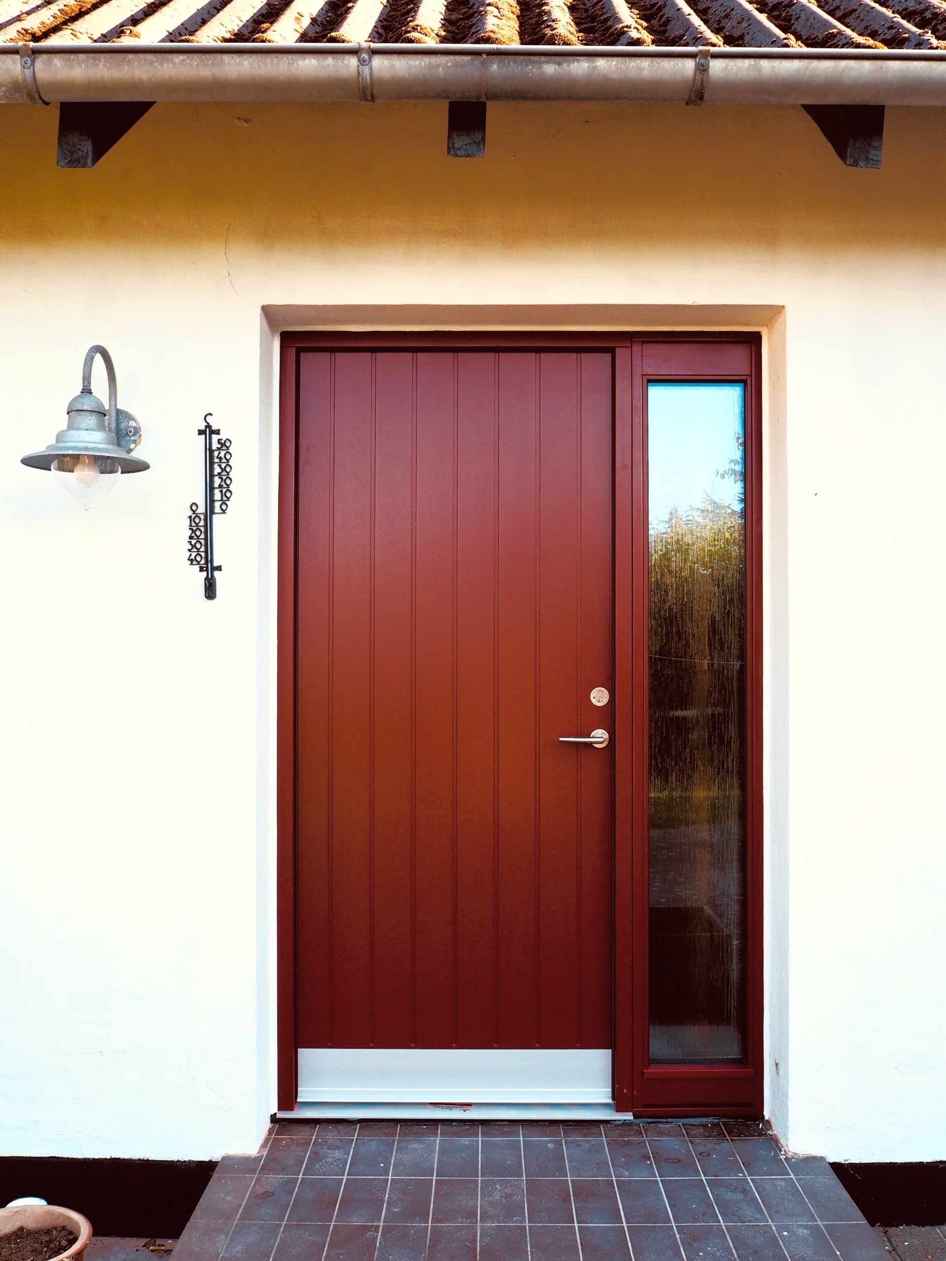 Behold our new door. (You can't behold our new window, though, because it's hard to take a decent snapshot of it.)