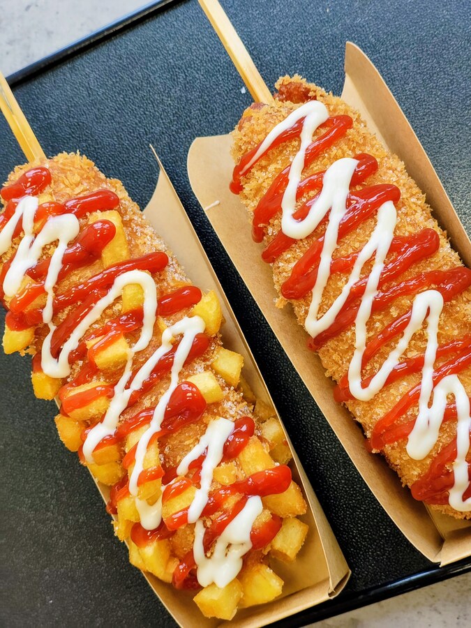 It's still not a foodie blog...

... but we stumbled upon a Korean street food joint, and we had to try Korean corn dogs. They taste exactly how they look--totally over the top.