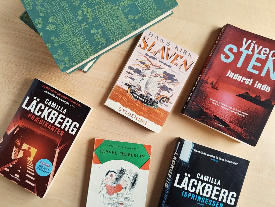 Oxfam in Frankfurt am Main was where we stocked up on books. We didn't expect to find a similar -- let alone better -- alternative to it in Denmark, and definitely not in Bindslev. But the local _Blå Kors_ surprised us in the most positive way. Not only do they have shelves upon shelves of books, but the books there are also way cheaper. To wit: the books in the attached photo cost us around €13.