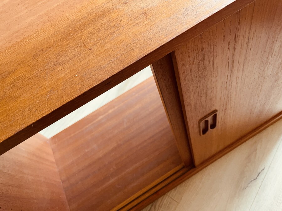 This cabinet is a perfect metaphor for our house. We found the cabinet in our local charity shop. It was old, relatively cheap, and it looked decent. There were a few issues, but nothing that required too much work.

Or so we thought.

When I started cleaning it, I discovered that the rear panel was loose because, apparently, someone had tried to pry it open using brute force (vandals!) and torn it from the attaching clips. The veneer on the right side of the cabinet is chipping away at an alarming rate, and I need to get wood filler to fix that before the problem gets worse. One of the shelves has visible stains that I’d like to mask. So now I also need to get special oil for that.

In other words, as with our house, I need to put some work into the cabinet before I can use it.

On the bright side, I felt unexpected pleasure working on the cabinet. I guess I can see myself in it: we’re both old and worse for wear. But with a little bit of TLC, there is still useful life left in us.