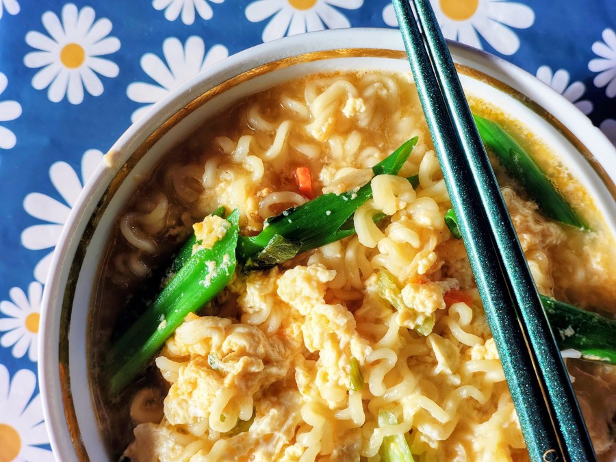 The simplest way to improve Shin Ramyun

Being mildly obsessed with instant ramen, I was thrilled to discover Korean Shin Ramyun. Of course, there are plenty of ways to trick out Shin Ramyun to make it taste even better. After watching countless YouTube videos on the subject, I've settled on a recipe that strikes a perfect balance between simplicity and taste.

- Whisk two eggs in a bowl.
- Chop a spring onion into large pieces.
- Put the noodles and the contents of the supplied packets into a pot with boiling water and cook for 2 minutes.
- Slowly pour the eggs into the pot while gently stirring the noodles. Add the chopped spring onion.
- Cook for another minute.
- Heaven!