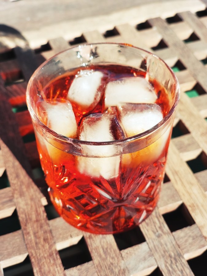 You know what? I think I'm a genius. Why? Because I've managed to improve upon the perfection that is the Negroni. It's a regular Negroni topped with -- wait for it -- tonic. I call it Negrontone. That is my gift to the world. I can retire now.