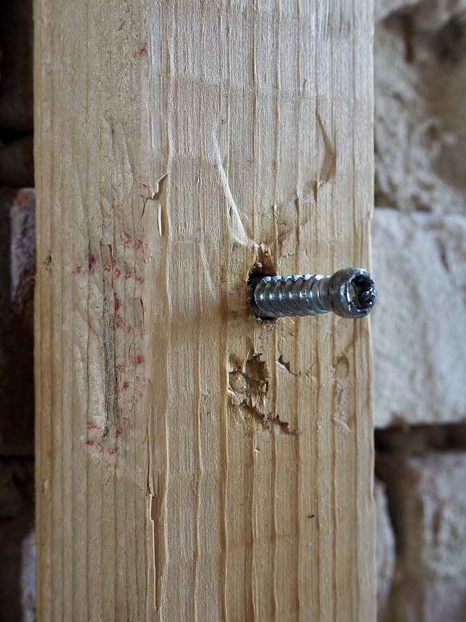 This damn screw is driving me insane. None of my tools could make it budge. A contractor fixing our roof used his more powerful screwdriver to unscrew it halfway. Except now the drive recess is stripped, and I can't get the screw to move any further, no matter how hard I try.