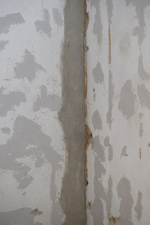 And here's what it looks like after.

On a related note, spackling and applying mortar is a satisfying experience.

By the way, the light gray spackled areas on the wall? All Malene's work. She's really good at it.